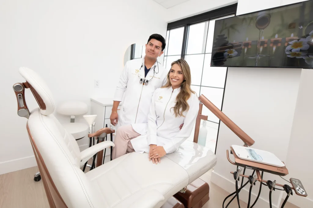 Dr. Andres Mu&ntilde;oz and Dr. Angee Mu&ntilde;oz in a treatment room at Harmony Smiles in Roselle Park, NJ